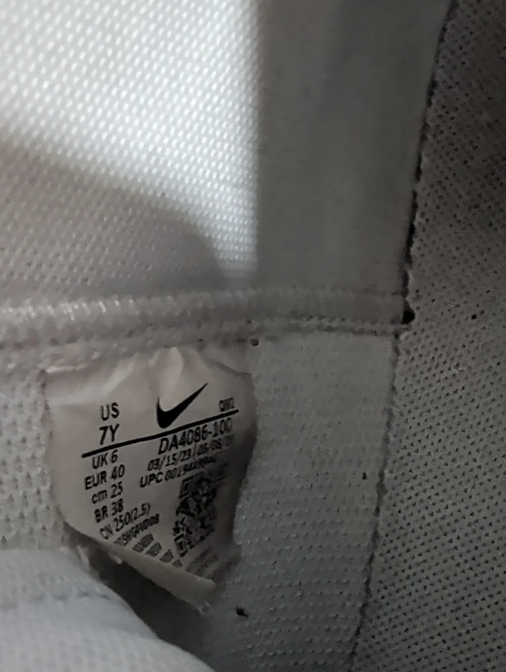 Nike White and Black High-Top Sneakers